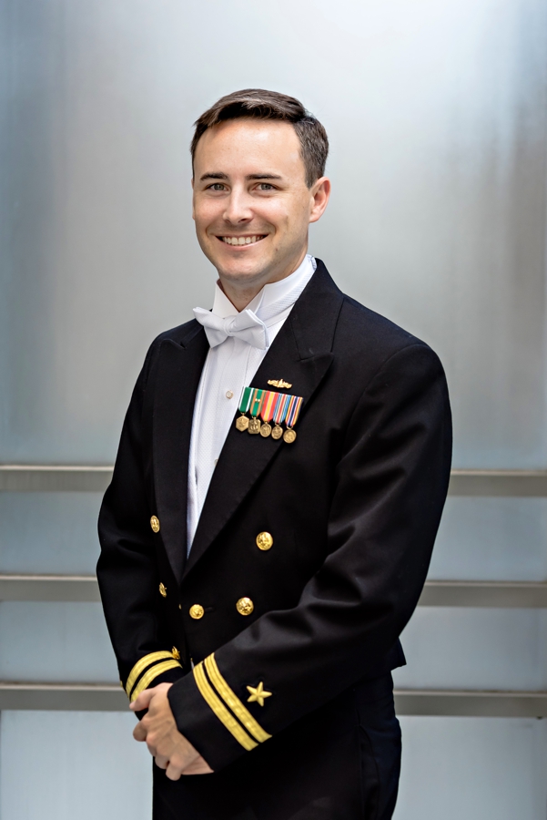 A groom in his Navy uniform before the ceremony.